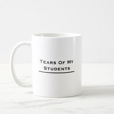 a coffee mug that says tears of my students