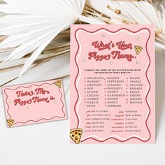 a pink pizza party game card next to some white flowers and palm fronds