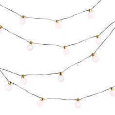 a string of white and gold lights on a white background