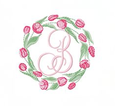 a monogrammed wreath with tulips and the letter g in pink on a white background