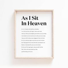 a black and white print with the words as i sit in heaven written below it