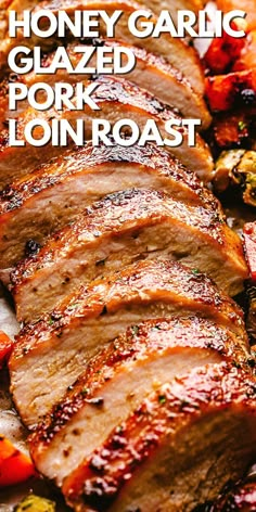 honey garlic glazed pork loin roast on a platter with text overlay that reads honey garlic glazed pork loin roast