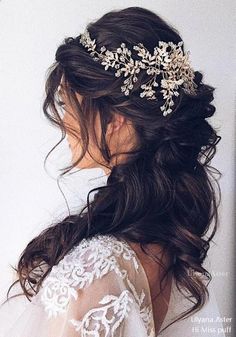 a woman wearing a bridal hair comb