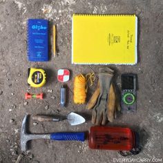 tools and supplies laid out on the ground