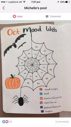 an open notebook with halloween coloring pages on it