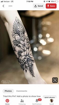 a woman's arm with flowers on it and the words explore written in black ink