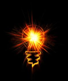 a bright light bulb is shining brightly on the dark background, and it appears to be an energy source