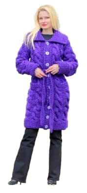 a woman in a purple coat is posing for the camera with her hands on her hips