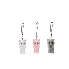 three key chains with small teddy bears hanging from each one's sides on a white background