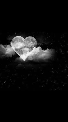 a heart shaped cloud floating in the dark sky with stars and clouds around it on a black background