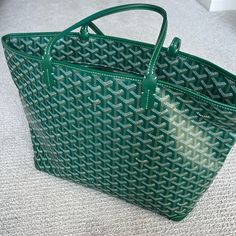 Authentic Goyard Artois Pm Tote With Zipper In Green I Bought This Last Year At The Chicago Location Downtown. It’s An Amazing Bag And Is In Amazing Condition. I’m Selling Because I Don’t Find Myself Reaching For It Enough! Comes With Dust Bag Green Goyard, Goyard Artois, Goyard Artois Mm, Goyard Mini Anjou Green, Goyard Anjou, Goyard Mini Anjou, Goyard Tote Bag, Goyard Anjou Mini Yellow, Goyard Tote