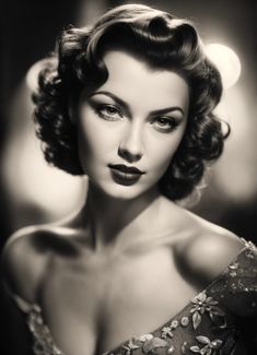 black and white photograph of a woman with short hair wearing an off shoulder evening dress