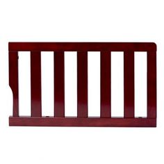 a wooden baby crib with no rails on the top and bottom bars in red