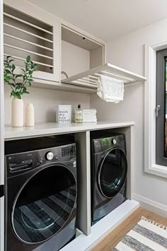 a washer and dryer in a small room