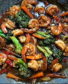 shrimp and broccoli stir fry in a wok