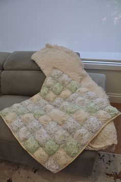 Wrap your little one in comfort with this Handmade Lightweight Baby Puff Blanket! Measuring 77x77cm, this adorable blanket is made from upcycled vintage fabrics, making each one truly unique. Gender neutral, it's soft, breathable, and perfect for warmer weather or layering, offering just the right amount of warmth without the weight. Key Features: *Sustainably Made: Crafted from upcycled vintage fabrics, combining charm and eco-friendliness. *Lightweight Design: Soft and breathable, perfect for