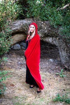 This full length Red Velvet Adult Cloak is perfect for a variety of dress up occasions; wear to any Halloween Party, Cosplay, Role Playing, Gothic, Steampunk, Renaissance, Medieval Events or a Masquerade Ball! Made from red velvet, measuring from 60.5" from neckline to hem Satin trimmed hood with ribbon tie closure Machine washable and made for repeat use Breathable, 100% Polyester Fabrics Costumes & accessories not included Fitted Red Costumes For Winter, Red Fitted Winter Costume, Fitted Red Winter Costumes, Red Winter Costume For Costume Party, Red Winter Party Costume, Red Costumes For Role Play And Cosplay Events, Fitted Red Cosplay Costume For Halloween, Red Costume For Cosplay Party, Red Fitted Cosplay Costume For Halloween