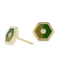 These petite hexagonal stud earrings are precisely inlaid with pieces of green bakelite in two complimentary shades. The bakelite halves are perfectly set in polished 18k yellow gold. At the center are gorgeous fine diamonds, bezel-set in 18k yellow gold. Metal 18-Karat Yellow Gold (Au750) Gemstones Diamond 0.02 ctw Dimensions Width 1 (Flat to Flat Sides) 7.75 mm (0.31 in)Width 2 (Point to Point) 8.50 mm (0.33 in) Notes Available in limited quantities SKU 10301069 Green Diamond, Bezel Setting, Diamond Earrings Studs, Shades Of Green, Bracelet Watch, Cufflinks, Diamond Earrings, 18k Gold, Yellow Gold