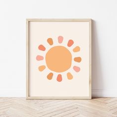 an orange and pink print on a white wall