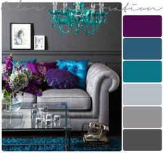 a living room with purple, blue and grey colors in the color scheme for the sofa