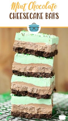 no - bake chocolate cheesecake bars stacked on top of each other with green frosting