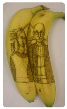 two bananas that have been carved to look like people