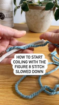 someone crocheting a piece of blue yarn with the words how to start coiling with the figure 8 stitch slowly down