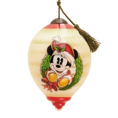 a mickey mouse ornament hanging from a string