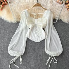 Chic White Tops With Boned Bodice, Chic White Top With Boned Bodice, Formal Fitted Chiffon Tops, Elegant White Square Neck Corset, Chic Formal Tops With Boned Bodice, Elegant White Spring Corset, Elegant Spring Tops With Boned Bodice, Elegant Spring Top With Boned Bodice, White Long Sleeve Corset For Spring