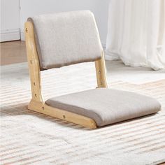 a chair that is sitting on top of a rug