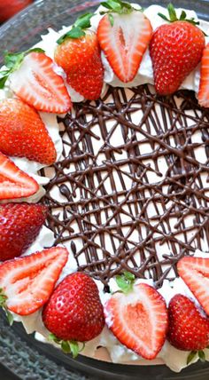 a chocolate cake with strawberries on top