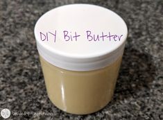 an empty jar with the words diy bit butter written on it