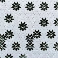 a white background with black flowers on it