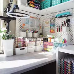 an organized craft room with lots of supplies