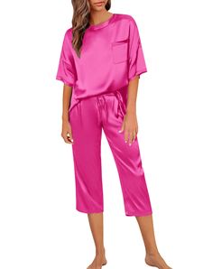 PRICES MAY VARY. 【Package Included】: These two-piece casual satin silk pajama sets include a silk short sleeves round neck shirt with soft high waist drawstring silk capri pajama pants with pockets on two sides. 【Highlight】: This loose satin silky sleepwear for women is designed with classic silk satin short sleeve crew neck tops blouses, which are entirely relaxed in tone with drop shoulders and, lightweight and comfortable fabric. These lounge capri pajama pants made with two side pockets are Satin Loungewear Set With Relaxed Fit, Relaxed Fit Satin Loungewear Sets, Casual Satin Sleepwear, Casual Satin Sets, Satin Sets For Pajama Party With Relaxed Fit, Casual Satin Sleep Sets, Casual Satin Sets For Pajama Party, Casual Satin Sets For Spring, Pajamas Silk