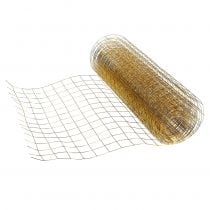 a roll of wire mesh sitting on top of a white surface