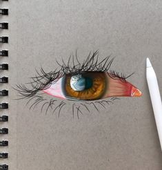 a pencil drawing of an eye with the iris opened and part of it being drawn