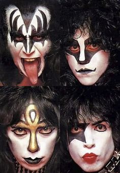 kiss band members with their faces painted white and black