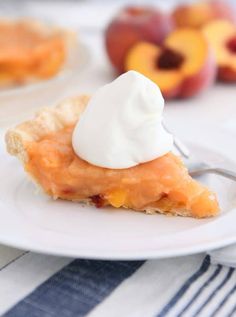 a slice of peach pie with whipped cream on top and the words, the most amazing fresh peach pie