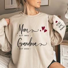 Mom Est Grandma Est And Grandkids Sweatshirt Cute and Creative Designs: Exquisite and lovely patterns, special elements make the perfect designs. The people who wear them will be proud. At the same time, they also show the love for family. Suitable for many occasions such as Christmas, Father's Day, Mother's Day, birthday This classic crew-neck sweatshirt is an essential basic item for anyone’s wardrobe. The ribbed cuffs on the sleeves and waist are reinforced, and the high-quality cotton ensure