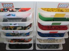 lego storage bins are stacked on top of each other