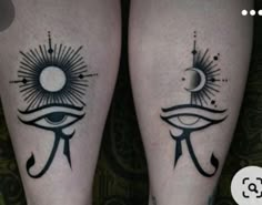 two people with tattoos on their legs, one has an eye and the other has a sun