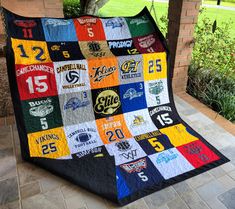 a quilt made to look like the basketball team's jersey is on display outside