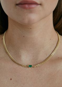 This statement necklace features a bezel set one carat weight Zambian green emerald—set in our classic Capri Curb Chain Necklace.Our emeralds are 100% natural, meaning they're not dyed or heat treated. No stone is exactly alike, so each necklace is one-of-a-kind. 14k solid gold—always Average weight: 23g Width: 4.3mm Stone measurements: 6mm x 4mm Lobster clasp closure This piece is made to order. Please allow 3-4 weeks for production during peak holiday season. This piece is only eligible for ex Emerald Set, The Bling Ring, Fancy Jewellery Designs, Curb Chain Necklace, Emerald Necklace, Jewelry Lookbook, Jewelry Design Necklace, Solid Gold Jewelry, Emerald Jewelry