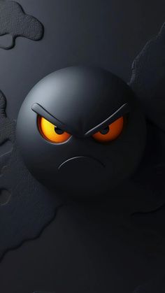 an angry looking black object with yellow eyes