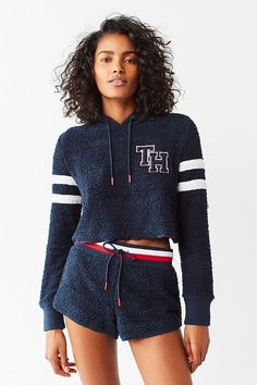 Varsity stripes and lettering Tommy Hilfiger Outfits Women Summer, Shirt Woman Outfit, Tommy Hilfiger T Shirt Woman, Tommy Hilfiger Outfits Women, Tommy Clothes, Fluffy Shorts, Varsity Hoodie, Tommy Hilfiger Hoodie, Cute Modest Outfits