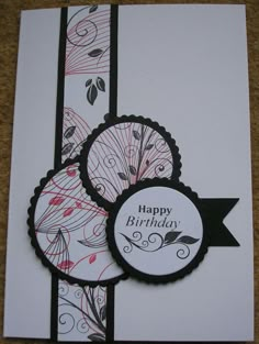 a close up of a birthday card with flowers on the front and back of it