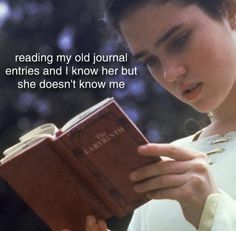 a woman reading a book with the caption reading my old journal entries and i know her but she doesn't know me