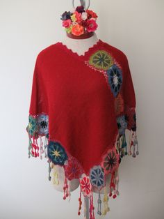 Beautiful and Unique Poncho with 100% Baby Alpaca This red gorgeous poncho is handknitted with a very thing thread of 100% baby alpaca that was naturally dyed with plants in the Altiplano of Peru, handmade by women from Pisac in the Andes of Peru. Alpaca wool is one of the most resistant and soft fibers in the world, it does not cause allergies, it is lightweight and so comfortable that its special for hand knitting. Alpaca wool is naturally breathable. We believe in the properties of natural fi Handmade Alpaca Poncho For Winter, Handmade Alpaca Bohemian Poncho, Handmade Bohemian Alpaca Poncho, Handmade Alpaca Poncho Shawl, Handmade Alpaca Shawl Poncho, Bohemian Alpaca Shawl One Size, Bohemian Wool Shawl, Bohemian Alpaca Shawl, One Size Bohemian Alpaca Poncho