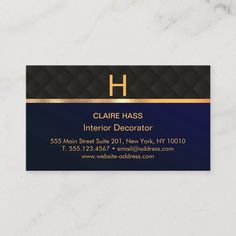 a business card for interior decorator with gold trimmings on the front and back